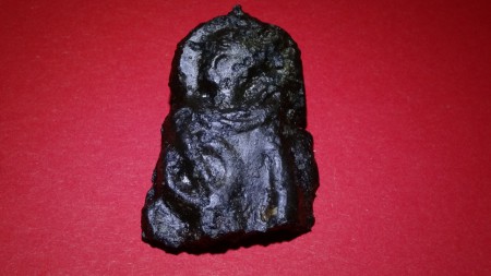 Stuk brons met romeinse afbeelding